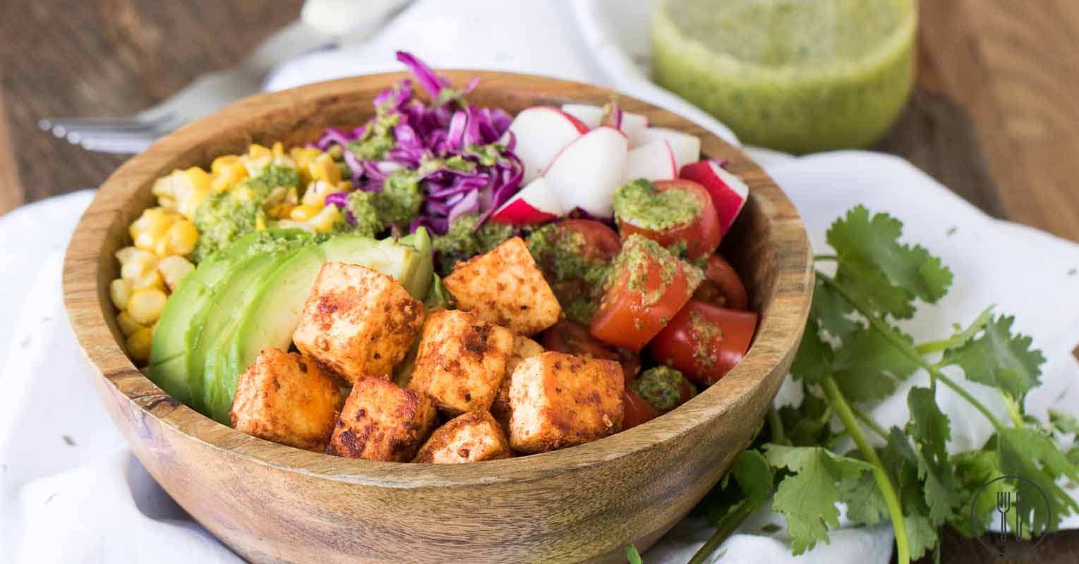 Rainbow quinoa salad with avocado lime dressing
